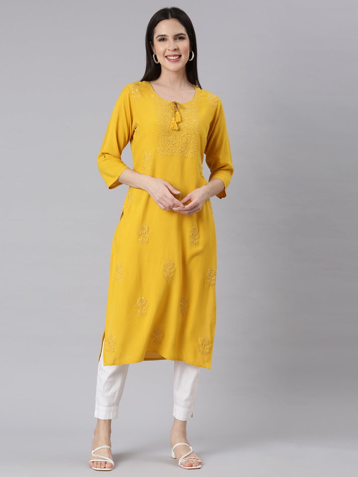 Neerus Yellow embellished straight kurti panelled - front view