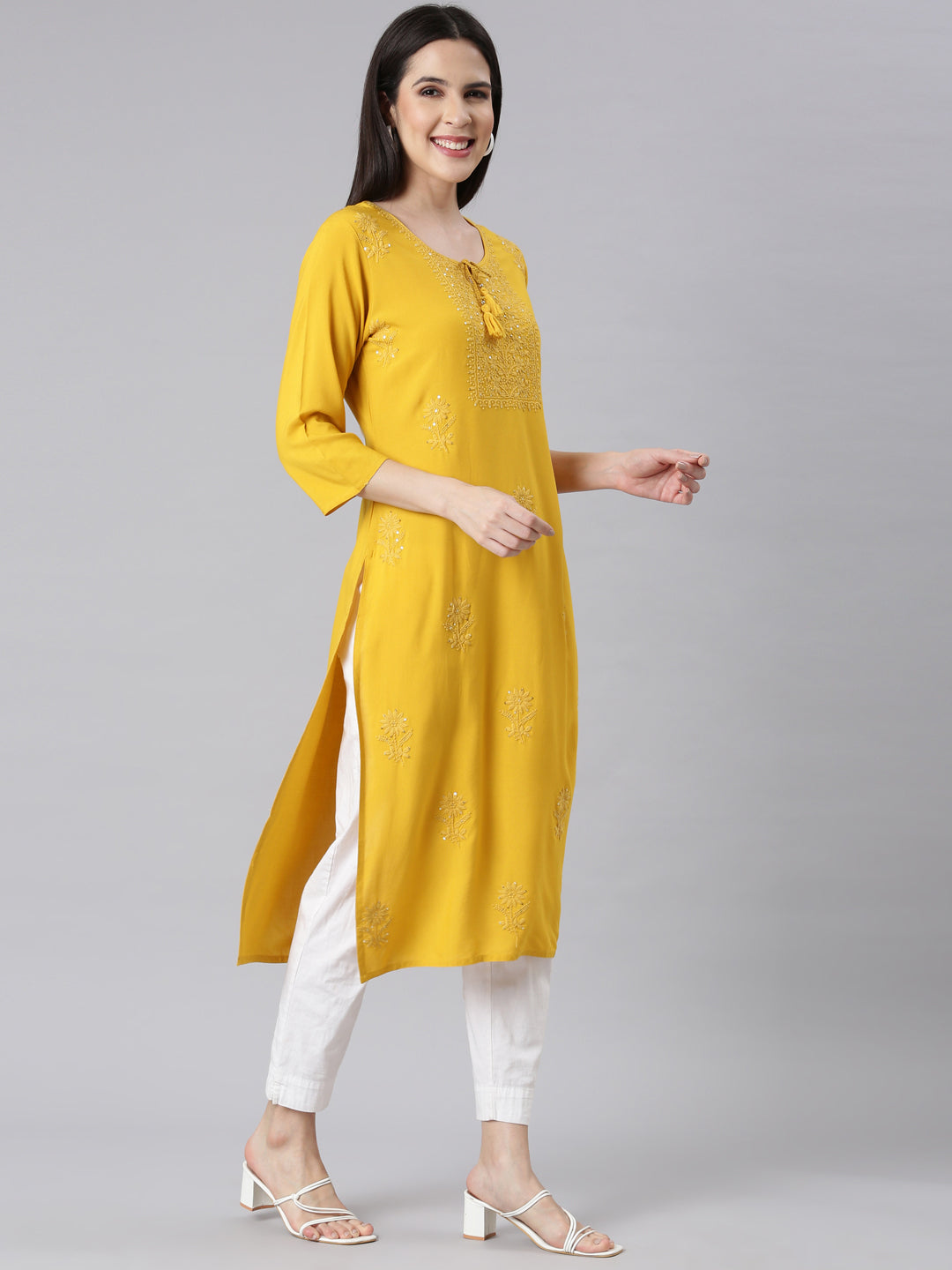 Neerus Yellow embellished straight kurti panelled - back view