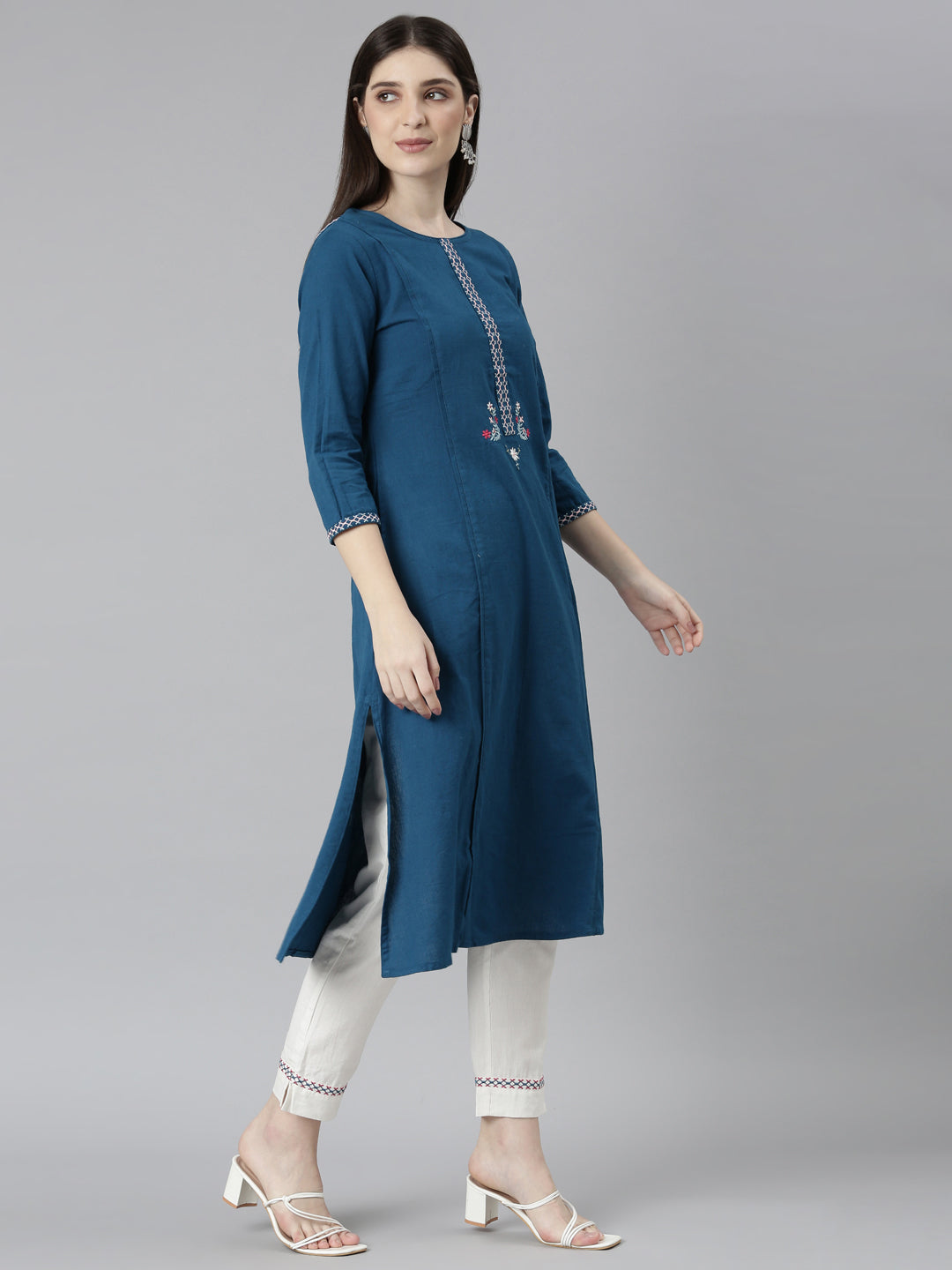 Neerus Blue solid straight kurta set - back view
