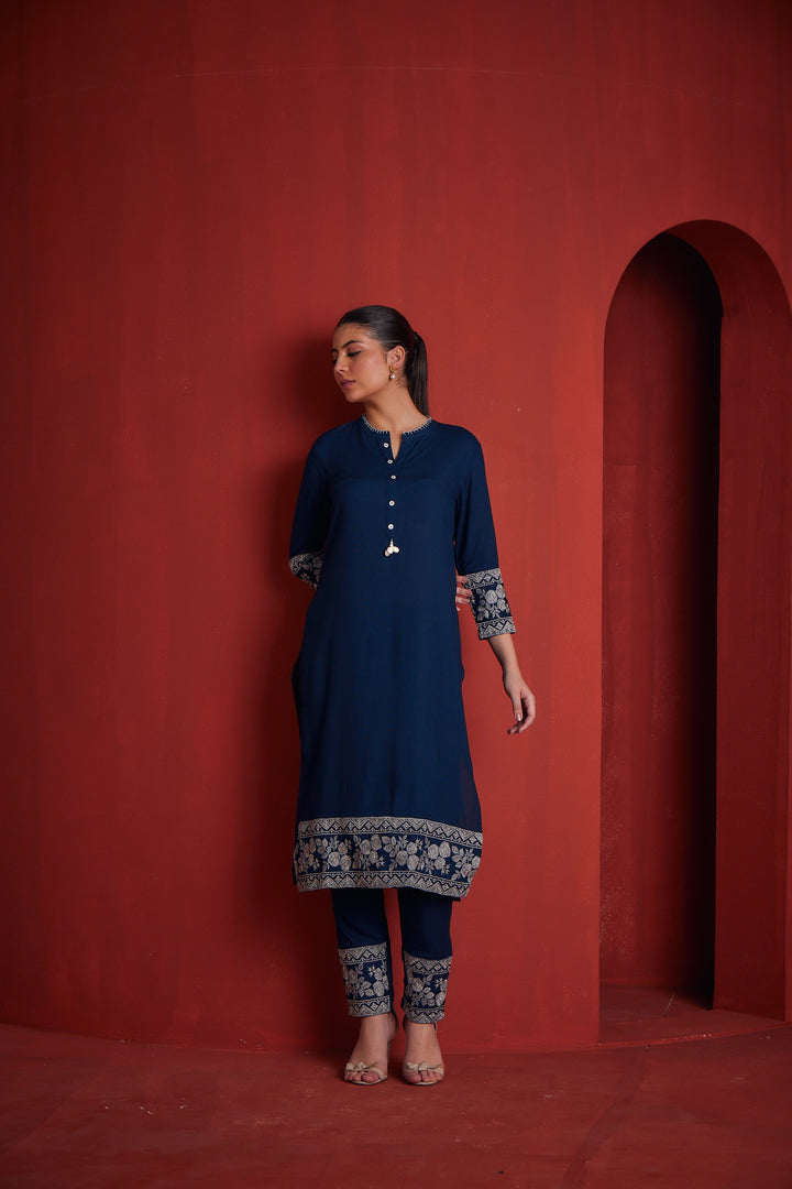 Neerus Peacock Regular Straight Solid Kurta Sets And Trousers