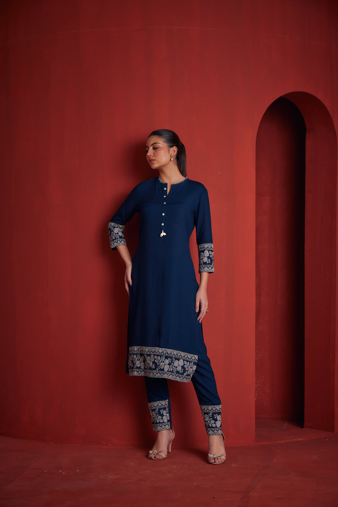 Neerus Peacock Regular Straight Solid Kurta Sets And Trousers
