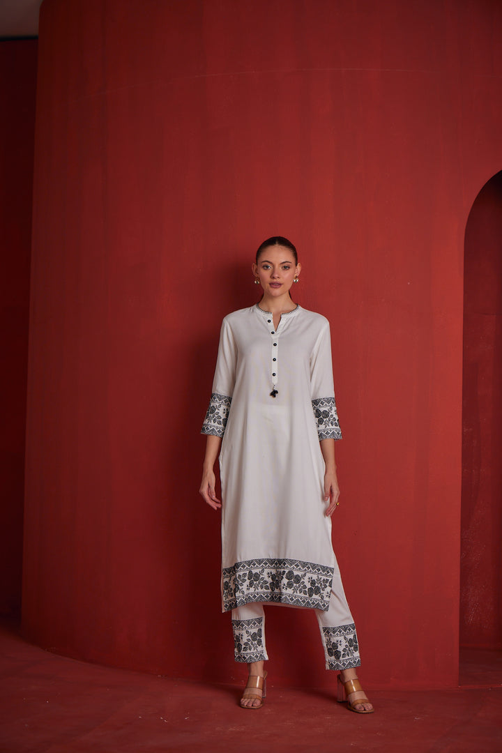 Neerus White Regular Straight Solid Kurta Sets And Trousers