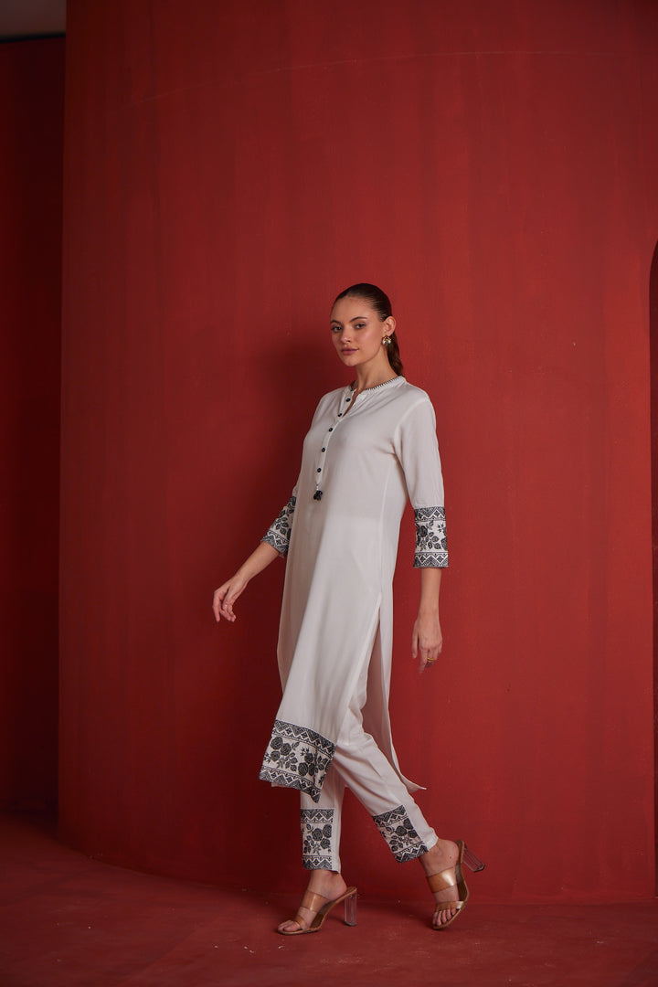 Neerus White Regular Straight Solid Kurta Sets And Trousers