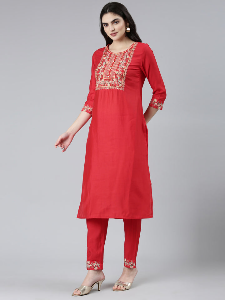 Neerus Red straight solid kurta set with trouser and dupatta - back view