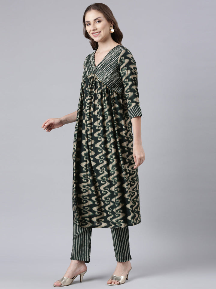 Neerus Green printed straight suit set panelled kurta with trouser and dupatta - back view