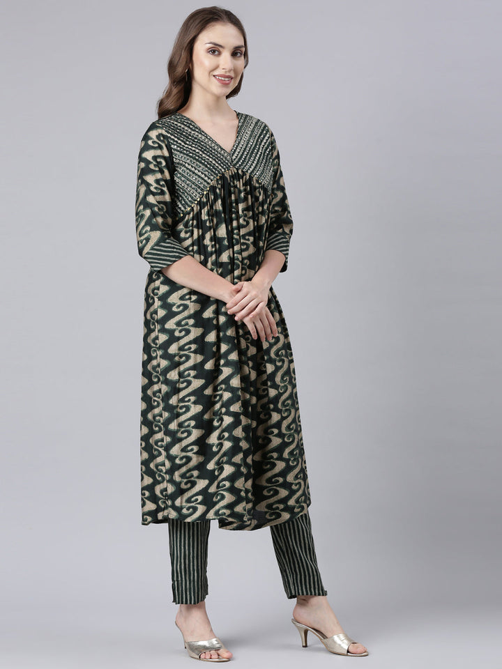 Neerus Green printed straight suit set panelled kurta with trouser and dupatta - side view