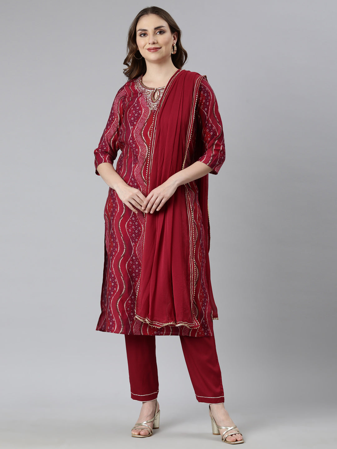 Neerus Maroon Bandhani printed suit set - front view