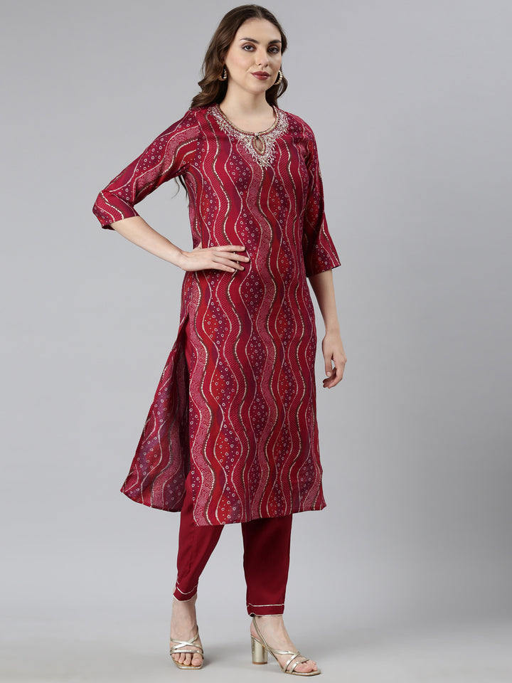 Neerus Maroon Bandhani printed suit set - back view