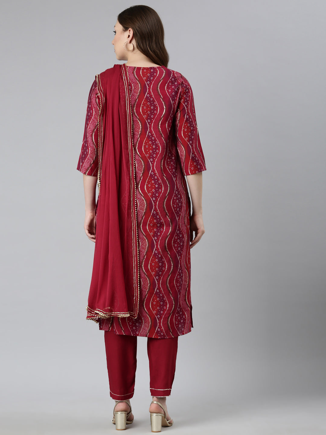 Neerus Maroon Bandhani printed suit set - side view