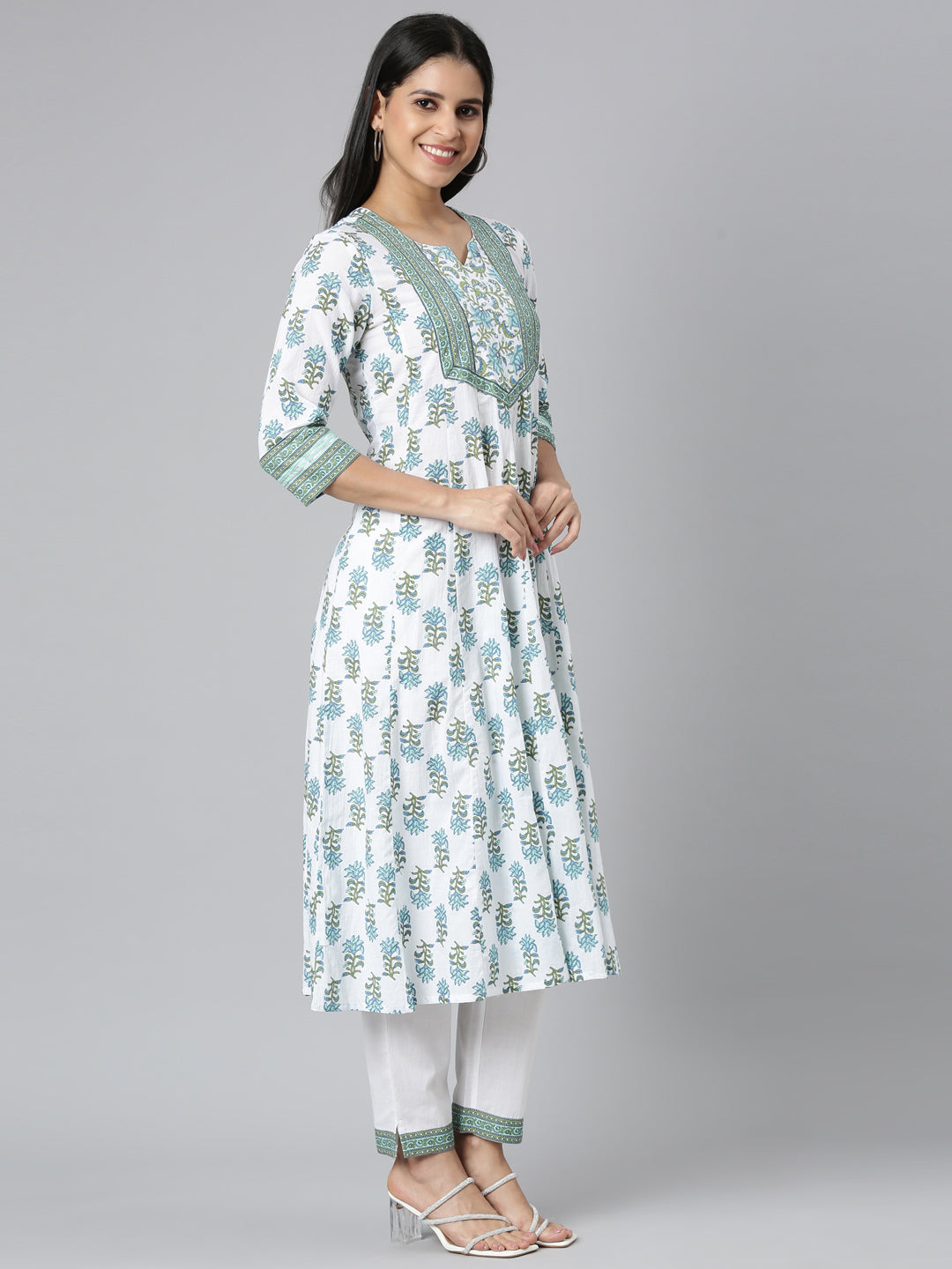 Neerus Green solid straight suit set kurta with trouser and dupatta - back view