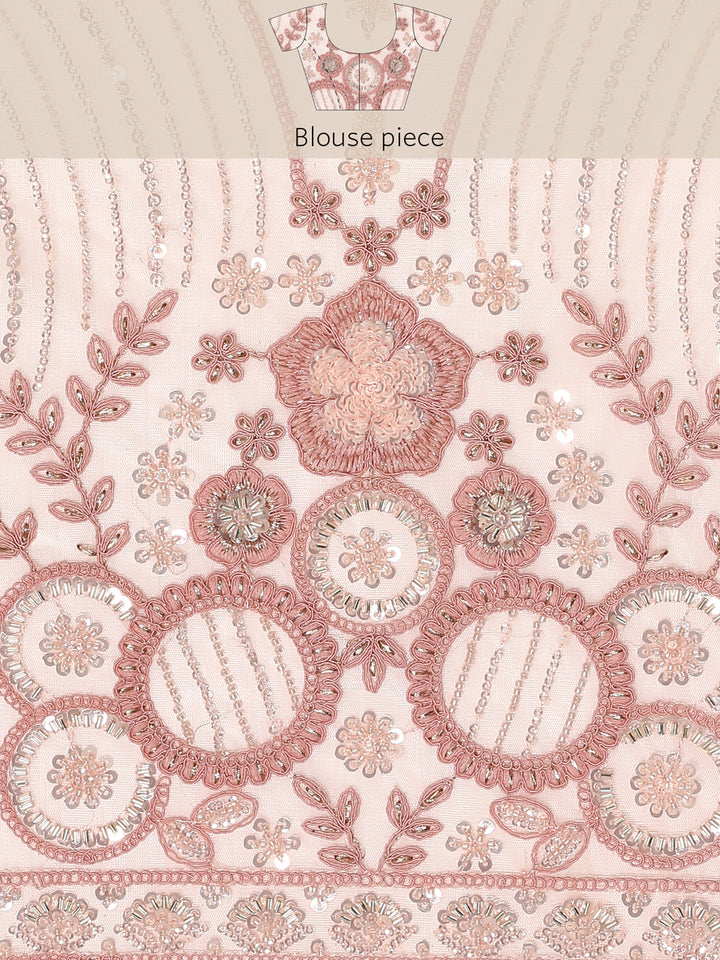 Peach net saree with pearl and sequins hand embroidery with scallop border