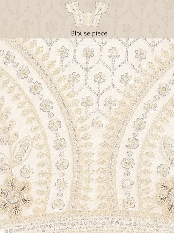 Cream net saree with pearl and sequins hand embroidery with scallop border