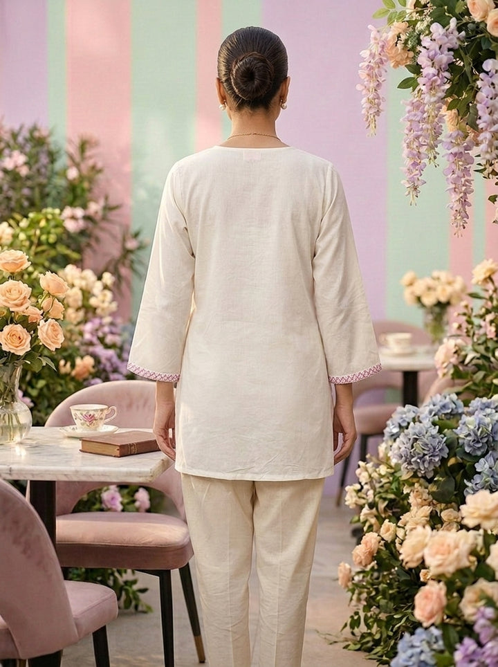 Neerus Purple linen thread embroidered kurti - back view