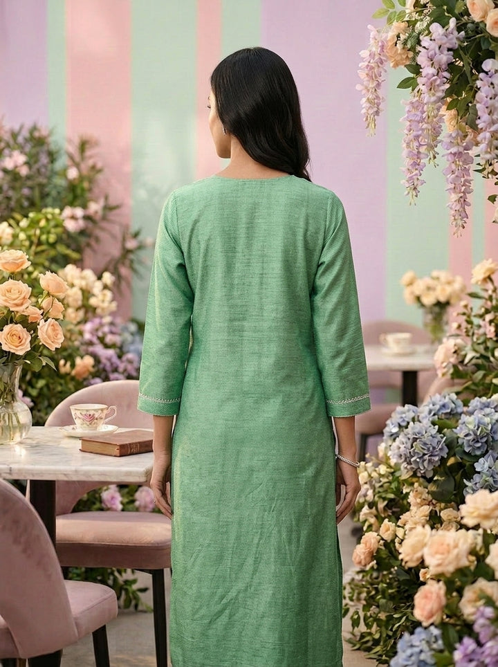 Neerus Green cotton thread embroidered kurti - back view