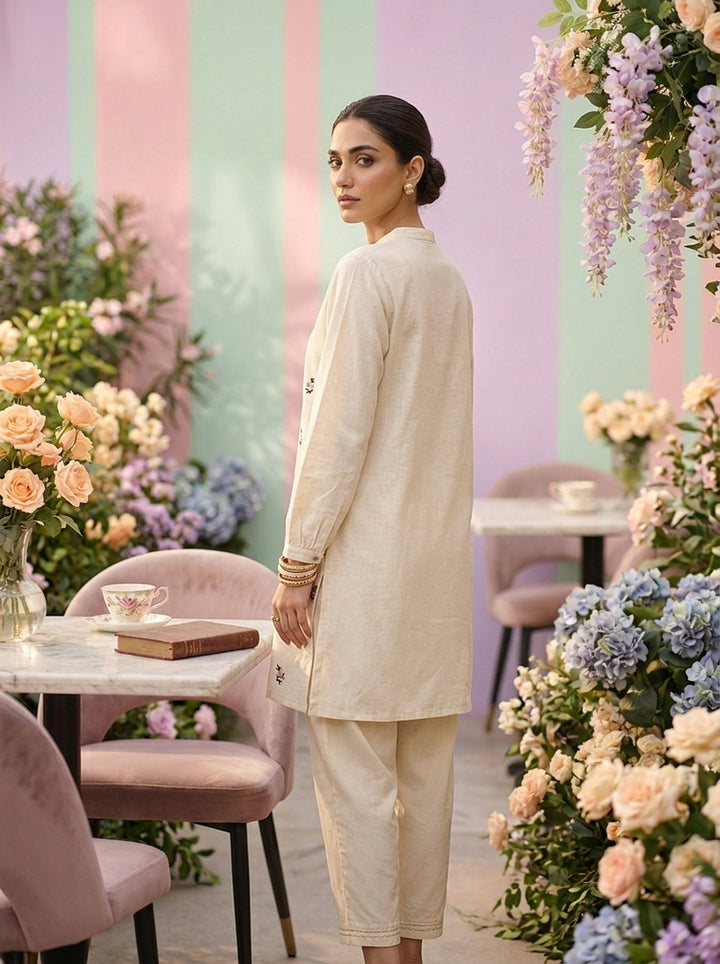 Neerus White cotton hand embroidered kurti - back view