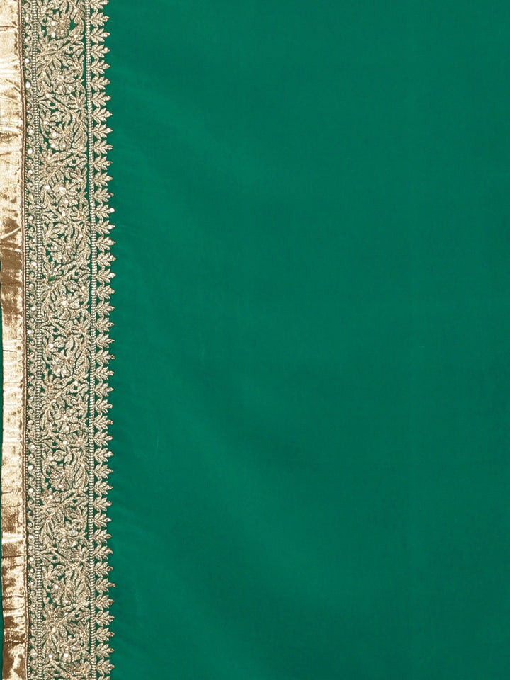 Neerus Green georgette textured saree with blouse - detail view 3