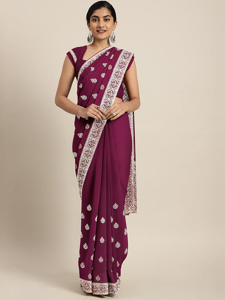 Neerus Pink georgette textured saree with blouse - front view