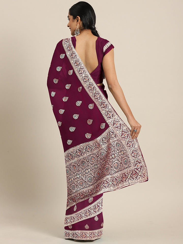 Neerus Pink georgette textured saree with blouse - back view