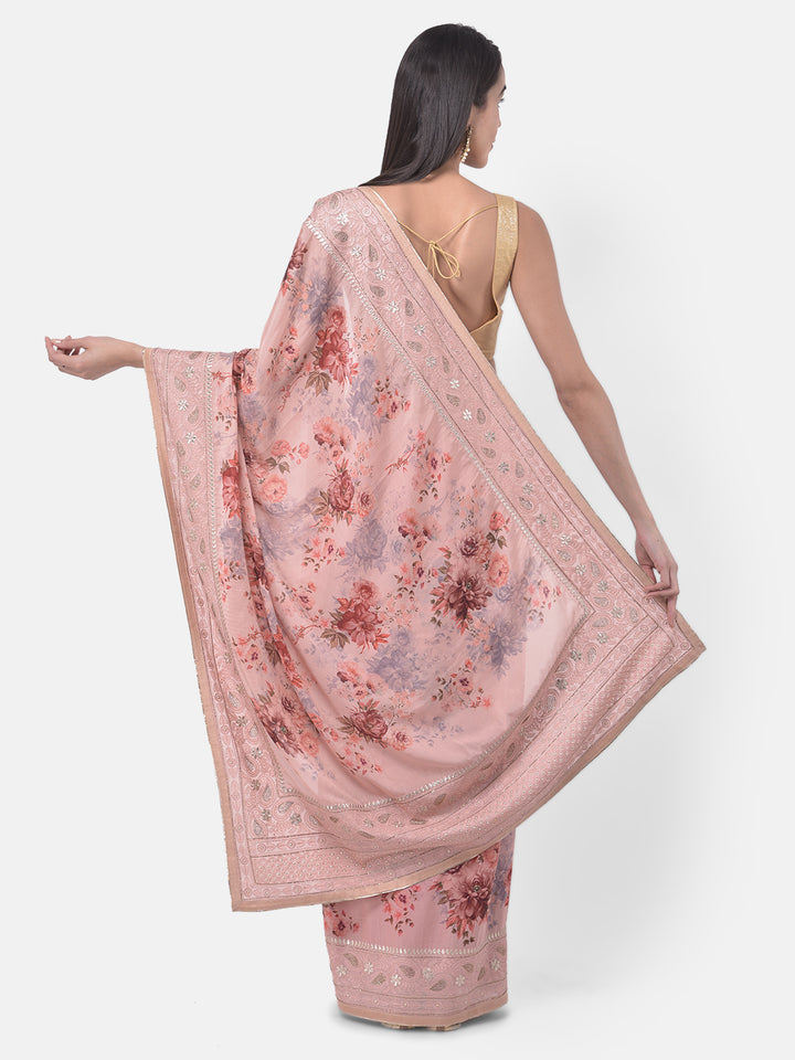 Neerus Orange crepe solid saree - back view
