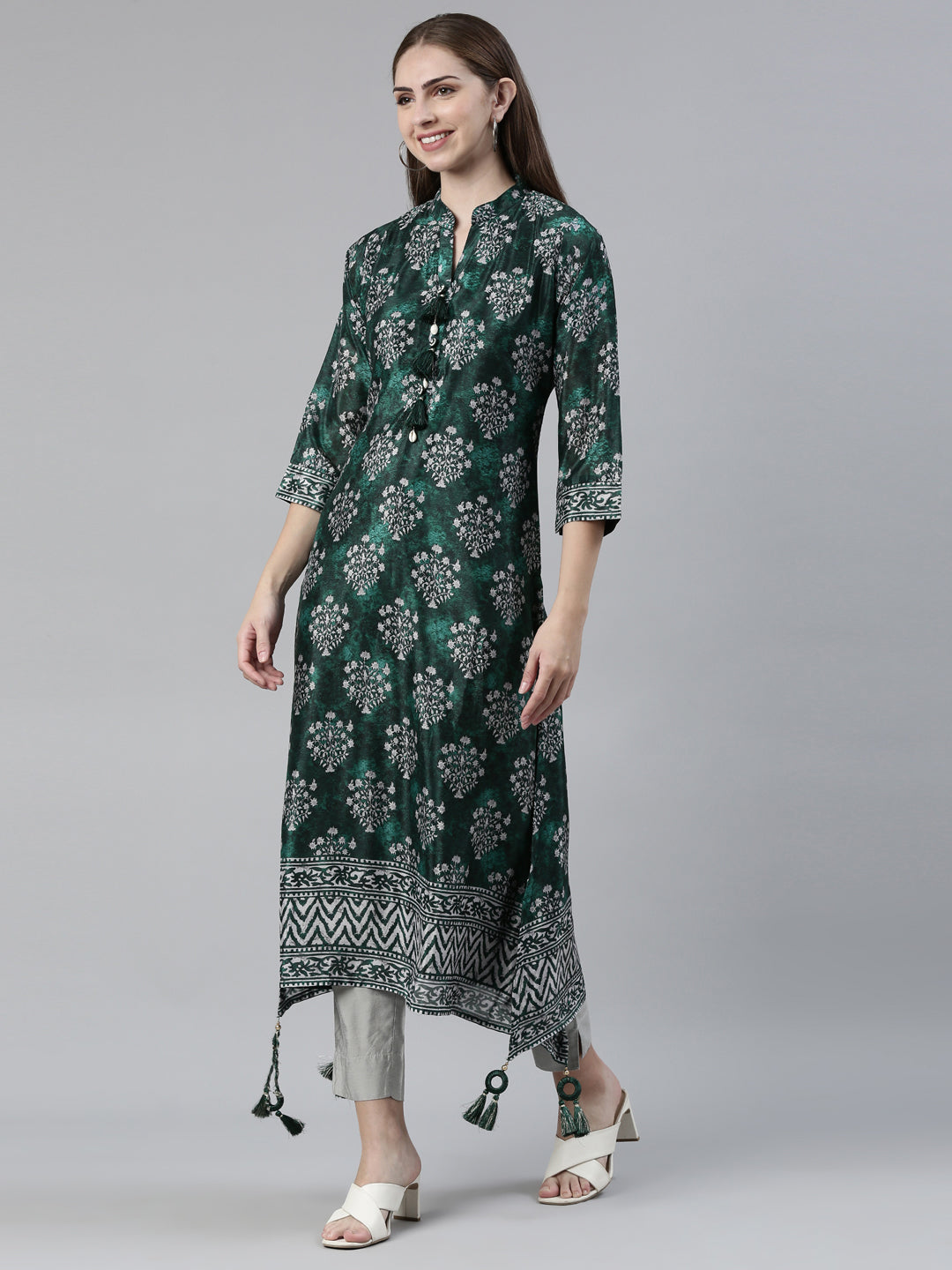 Neerus Green Curved Regular Crepe Kurtas