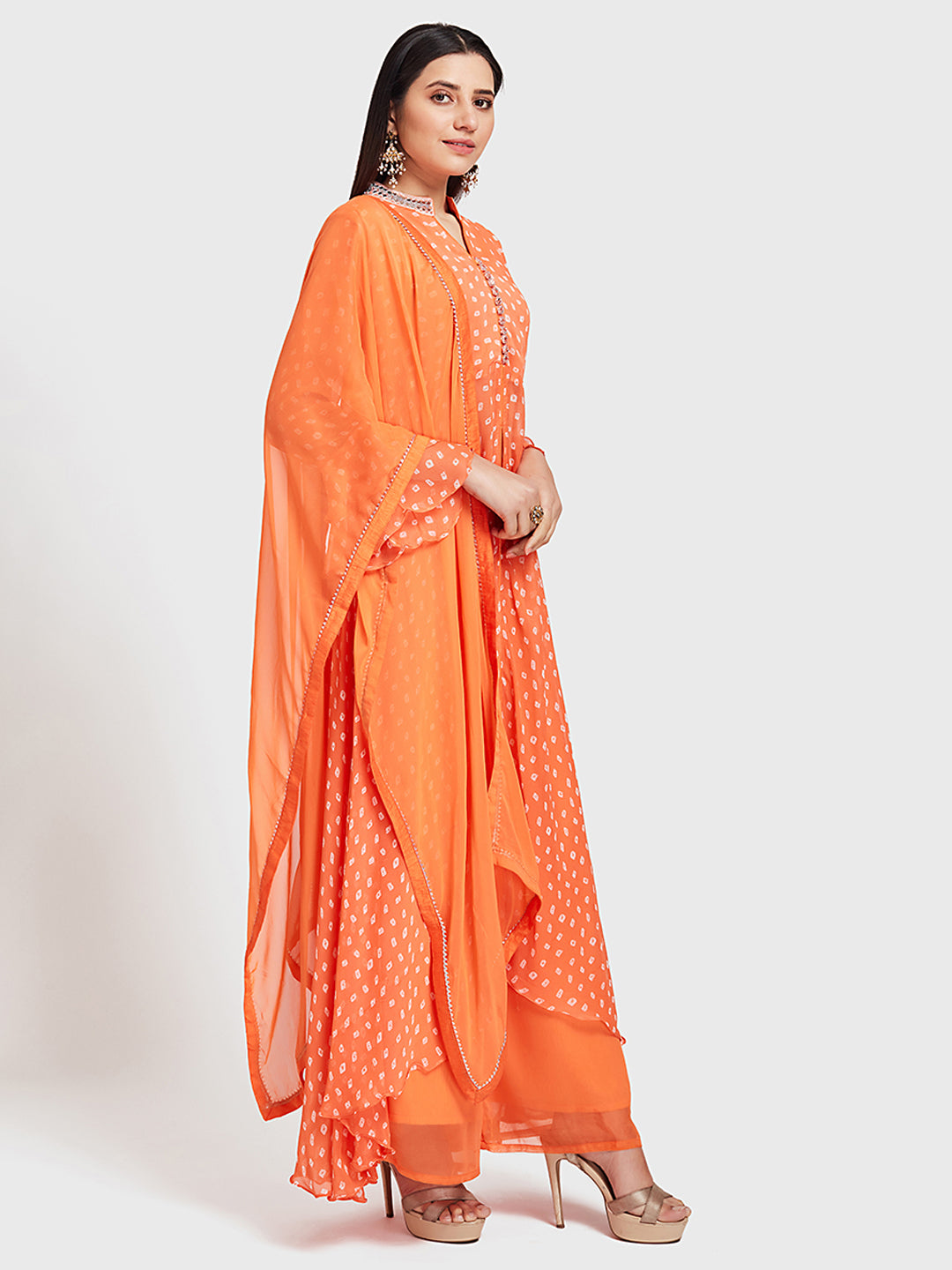 Neerus Orange Bandhani printed kurta set with palazzo and dupatta - front view