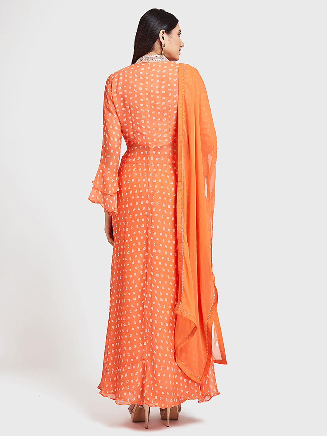 Neerus Orange Bandhani printed kurta set with palazzo and dupatta - back view