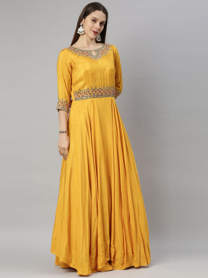 Neerus Yellow silk embroidered Anarkali suit set - back view