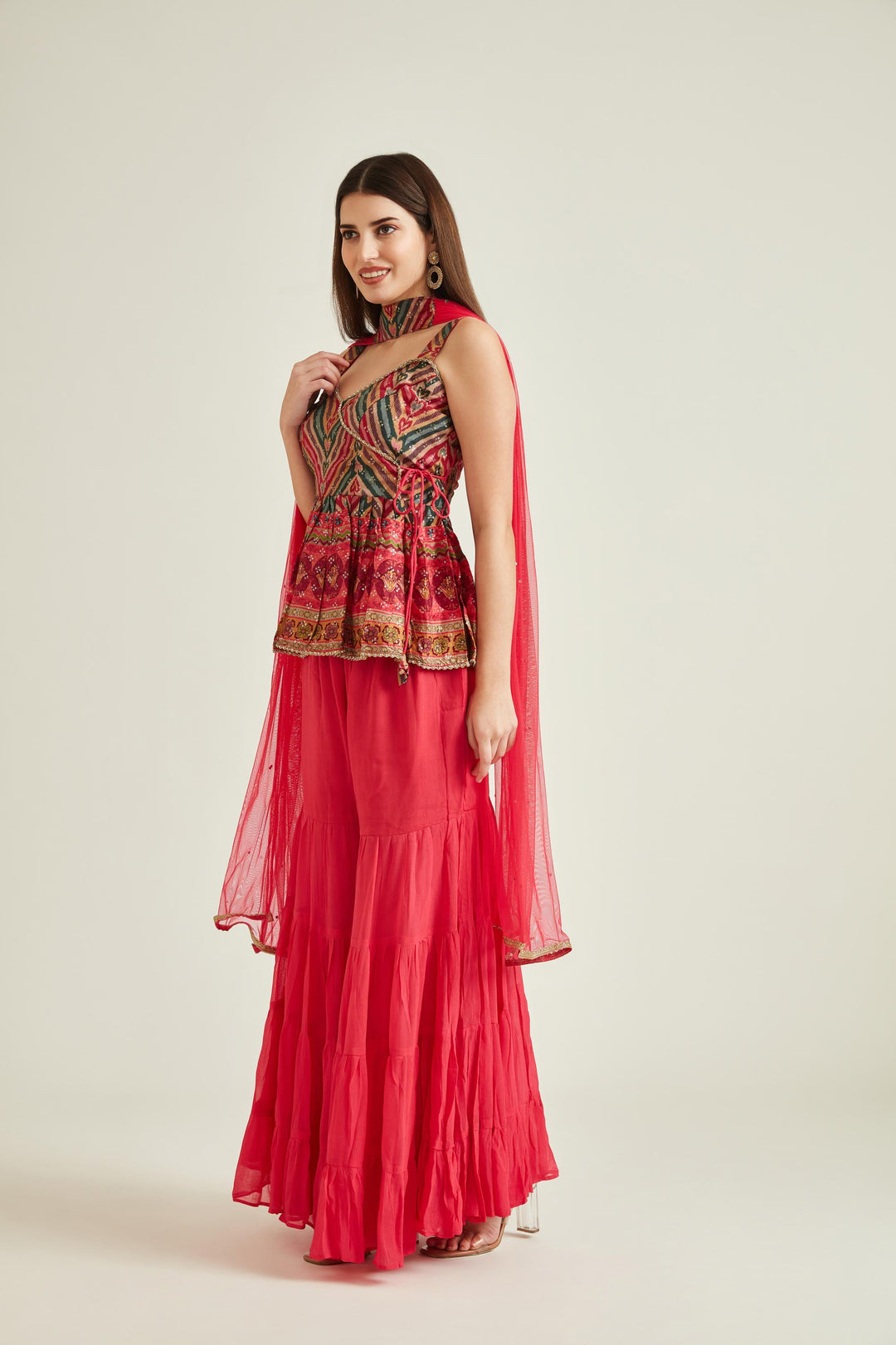 Neerus Pink silk embellished kurta set with sharara and dupatta - front view