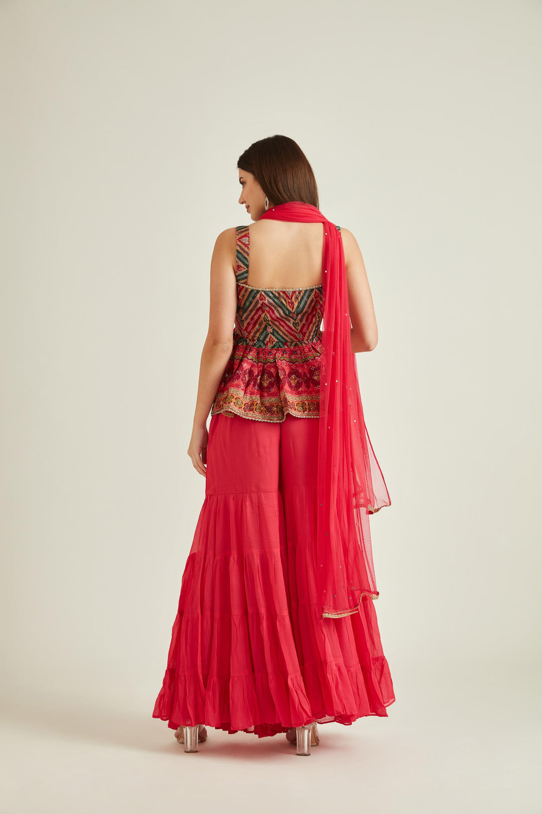 Neerus Pink silk embellished kurta set with sharara and dupatta - back view