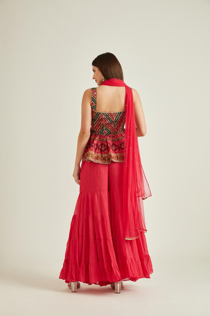 Neerus Pink silk embellished kurta set with sharara and dupatta - back view