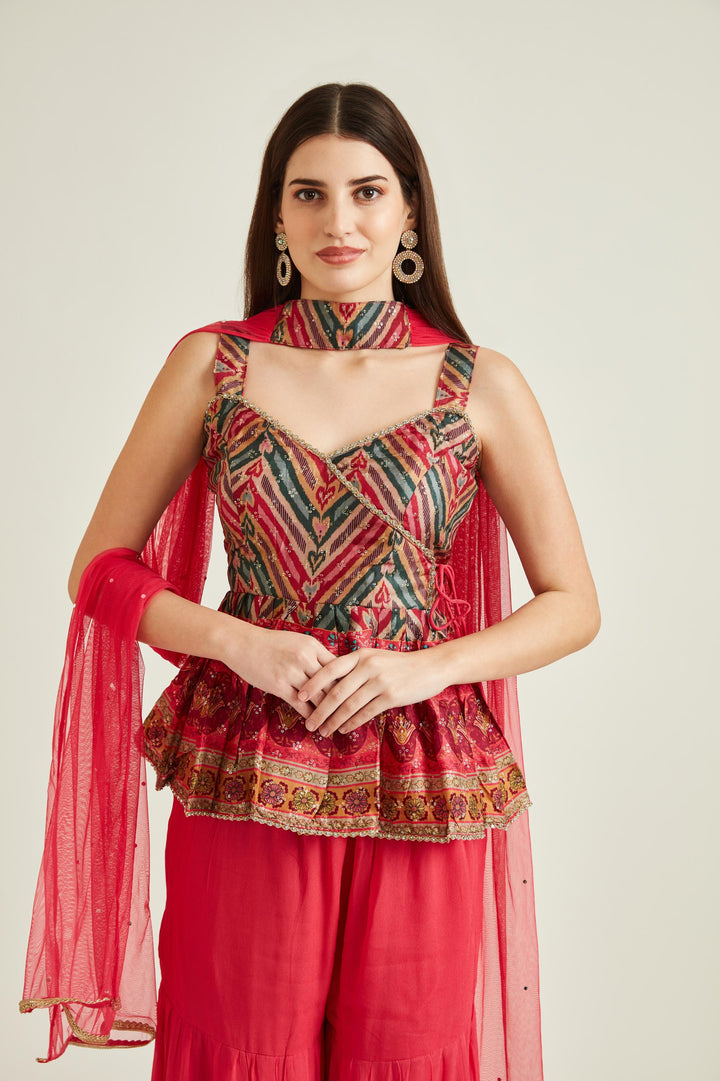 Neerus Pink silk embellished kurta set with sharara and dupatta - side view