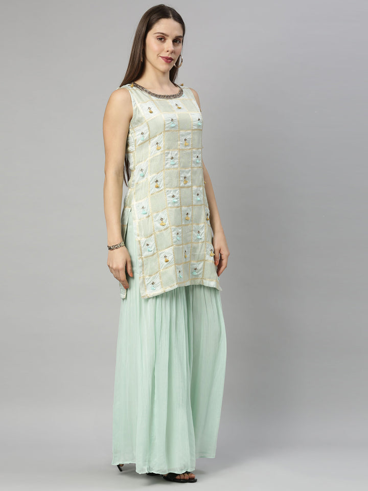 Neerus Green silk embroidered kurta set with sharara - side view