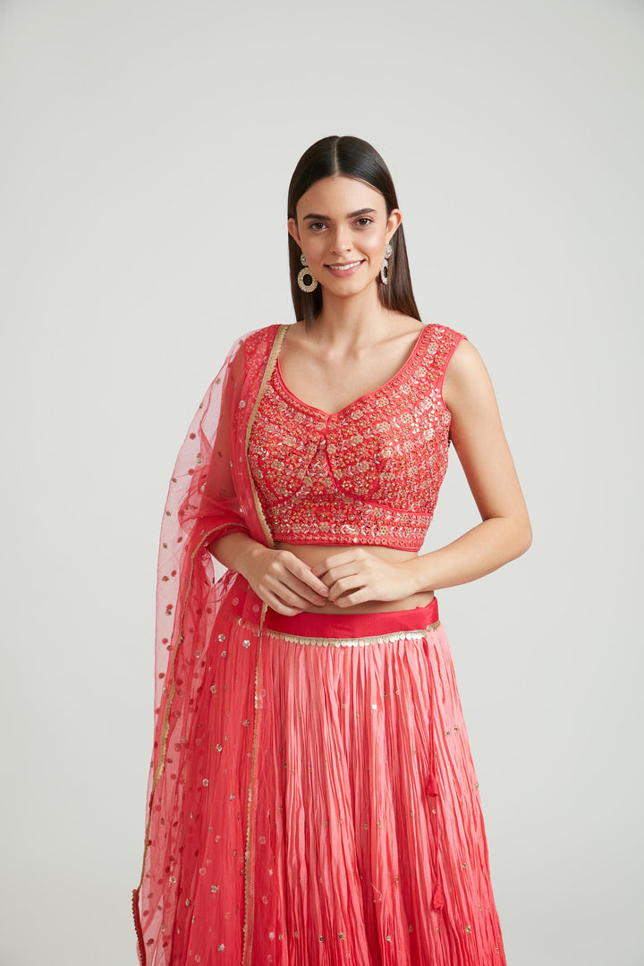 Neerus Red silk lehenga choli set - back view