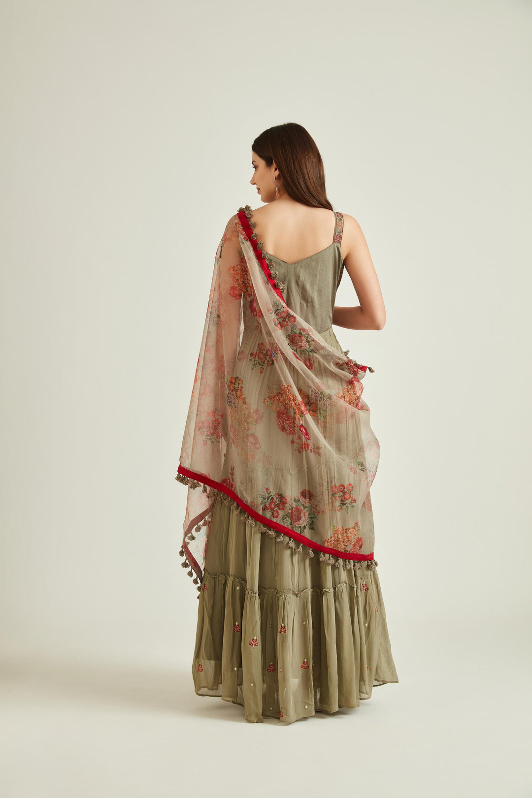 Neerus Green georgette mirror work tiered gown with dupatta - back view