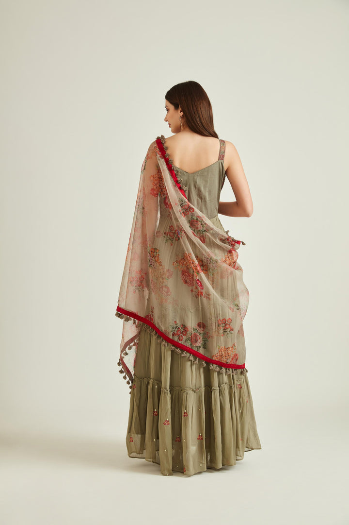 Neerus Green georgette mirror work tiered gown with dupatta - back view