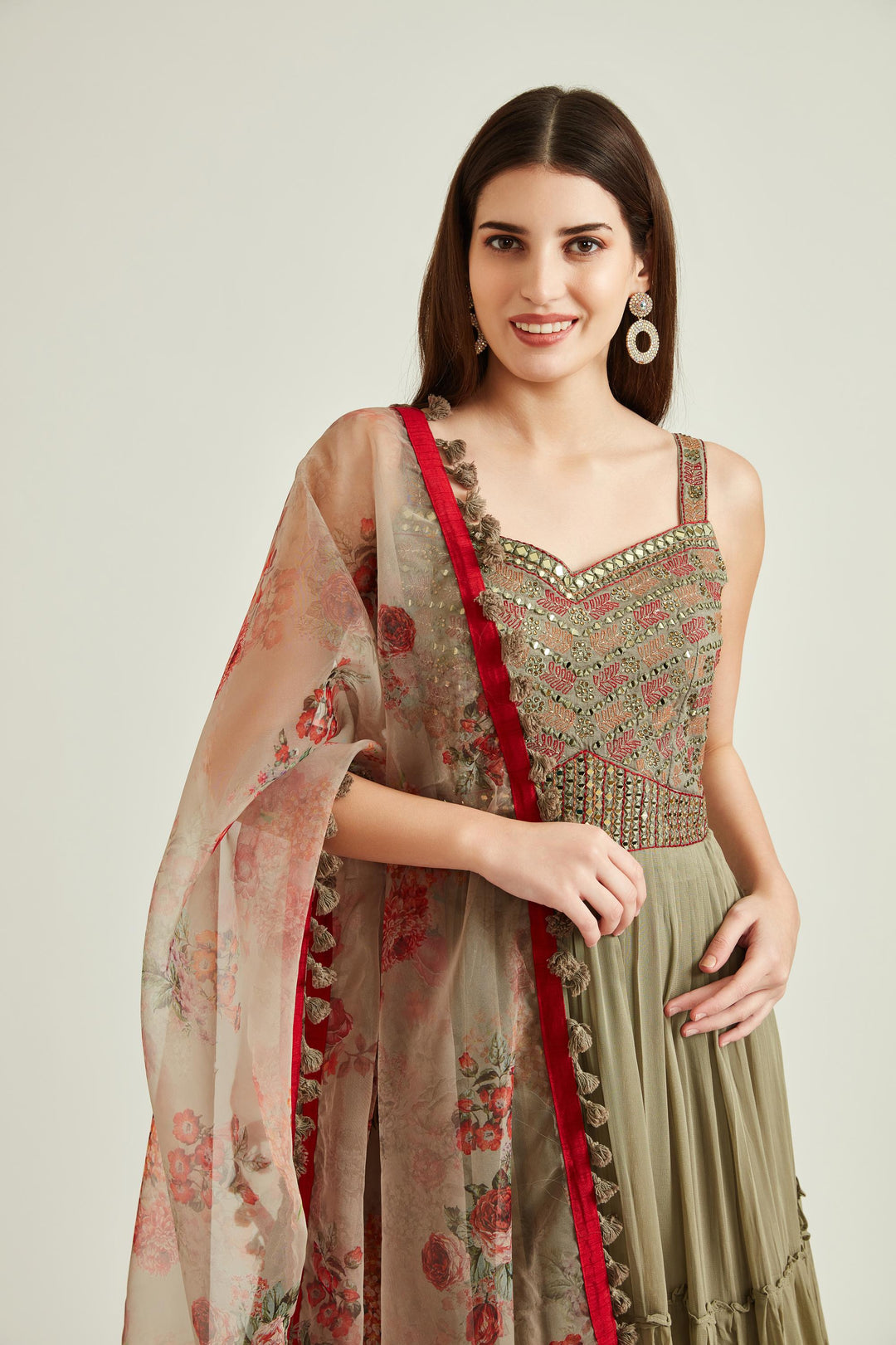Neerus Green georgette mirror work tiered gown with dupatta - side view