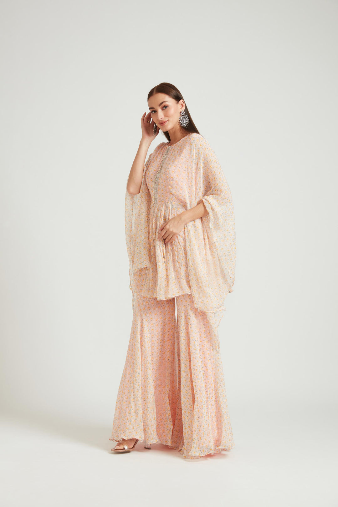 Neerus Orange georgette kurta set - back view