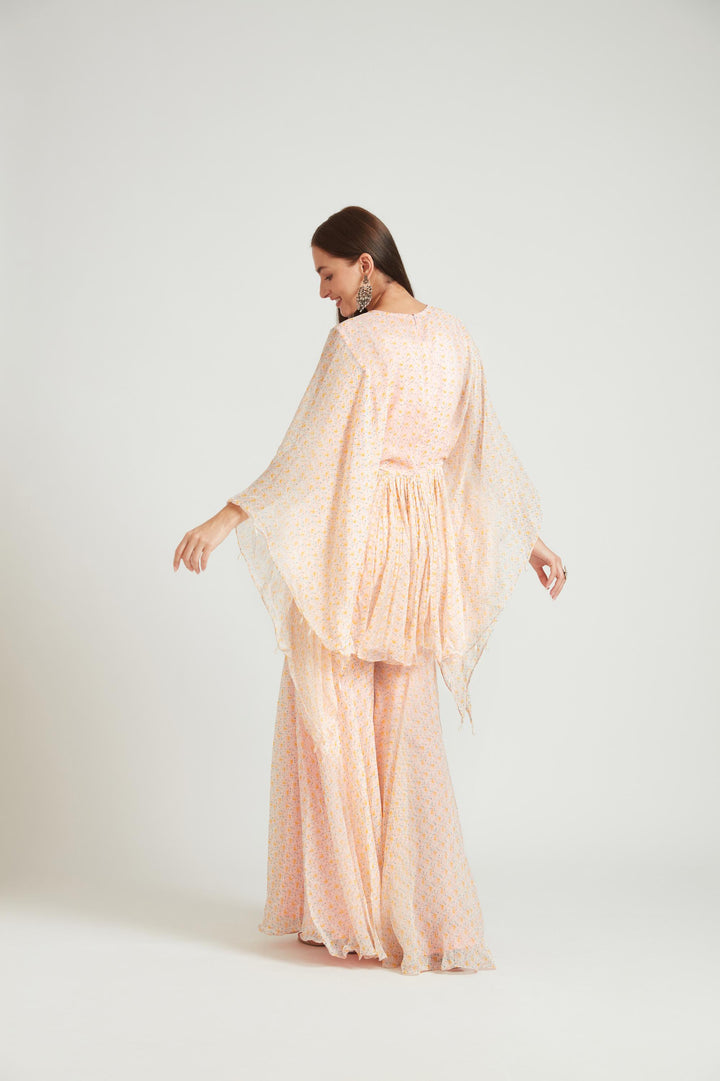 Neerus Orange georgette kurta set - side view