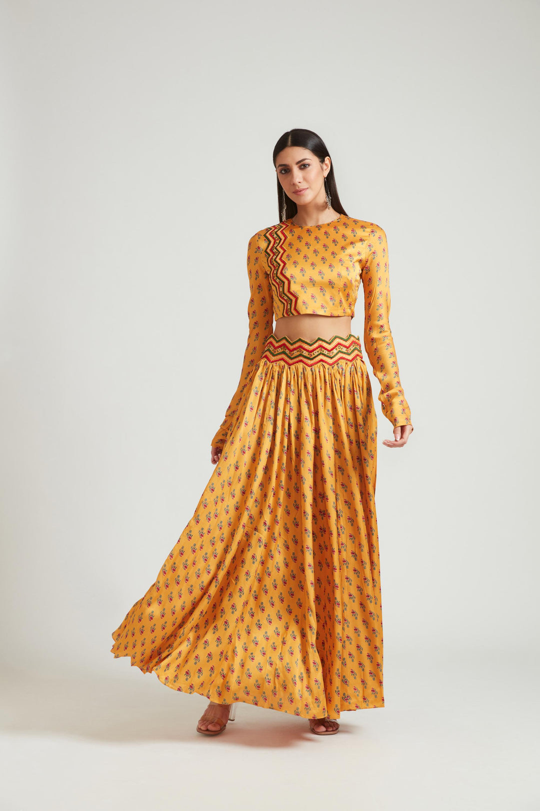Neerus Yellow silk embellished lehenga choli set - front view