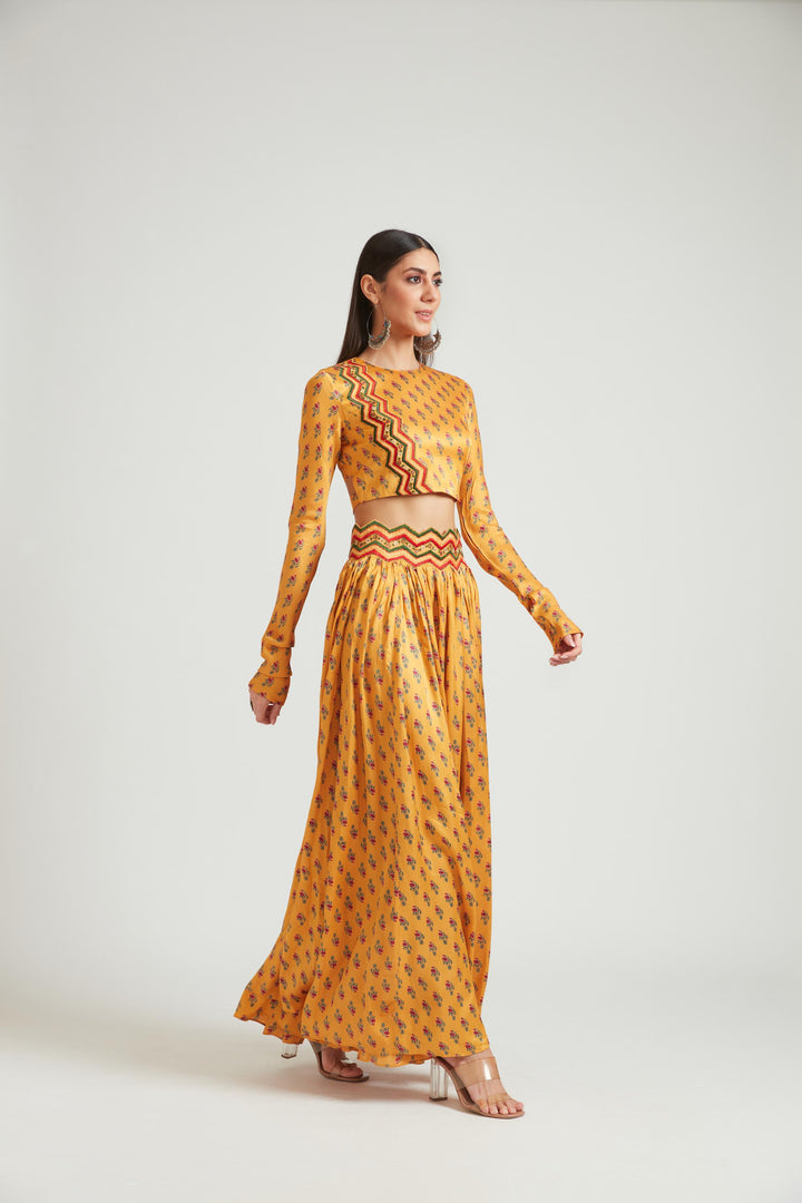 Neerus Yellow silk embellished lehenga choli set - back view