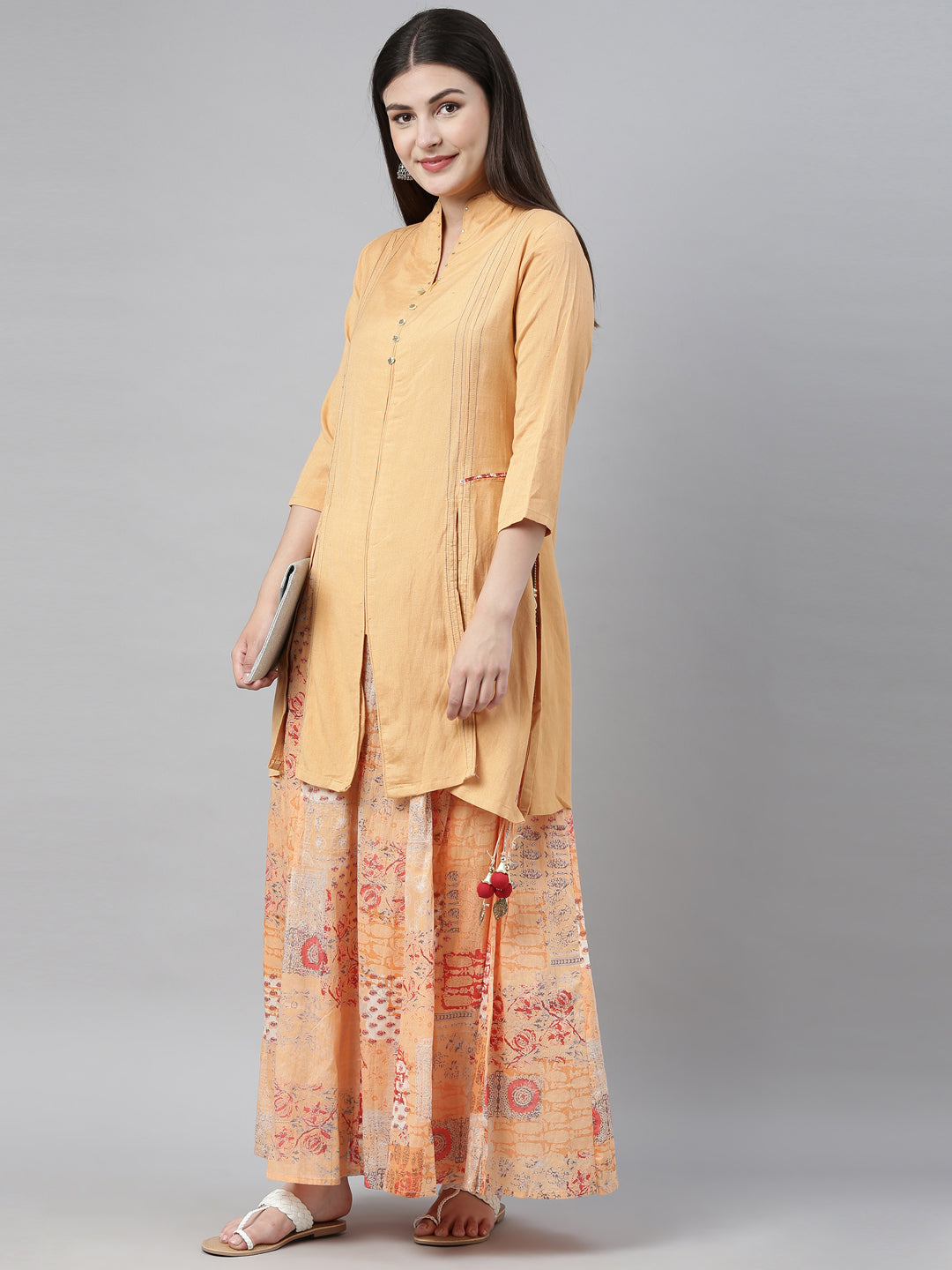 Neerus Orange cotton printed straight kurti - front view