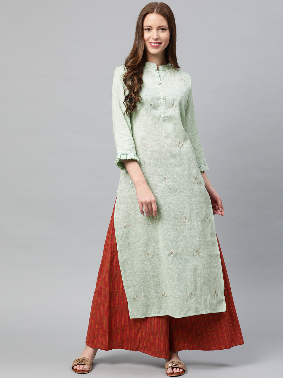 Neerus Green slub cotton embroidered straight kurta - front view