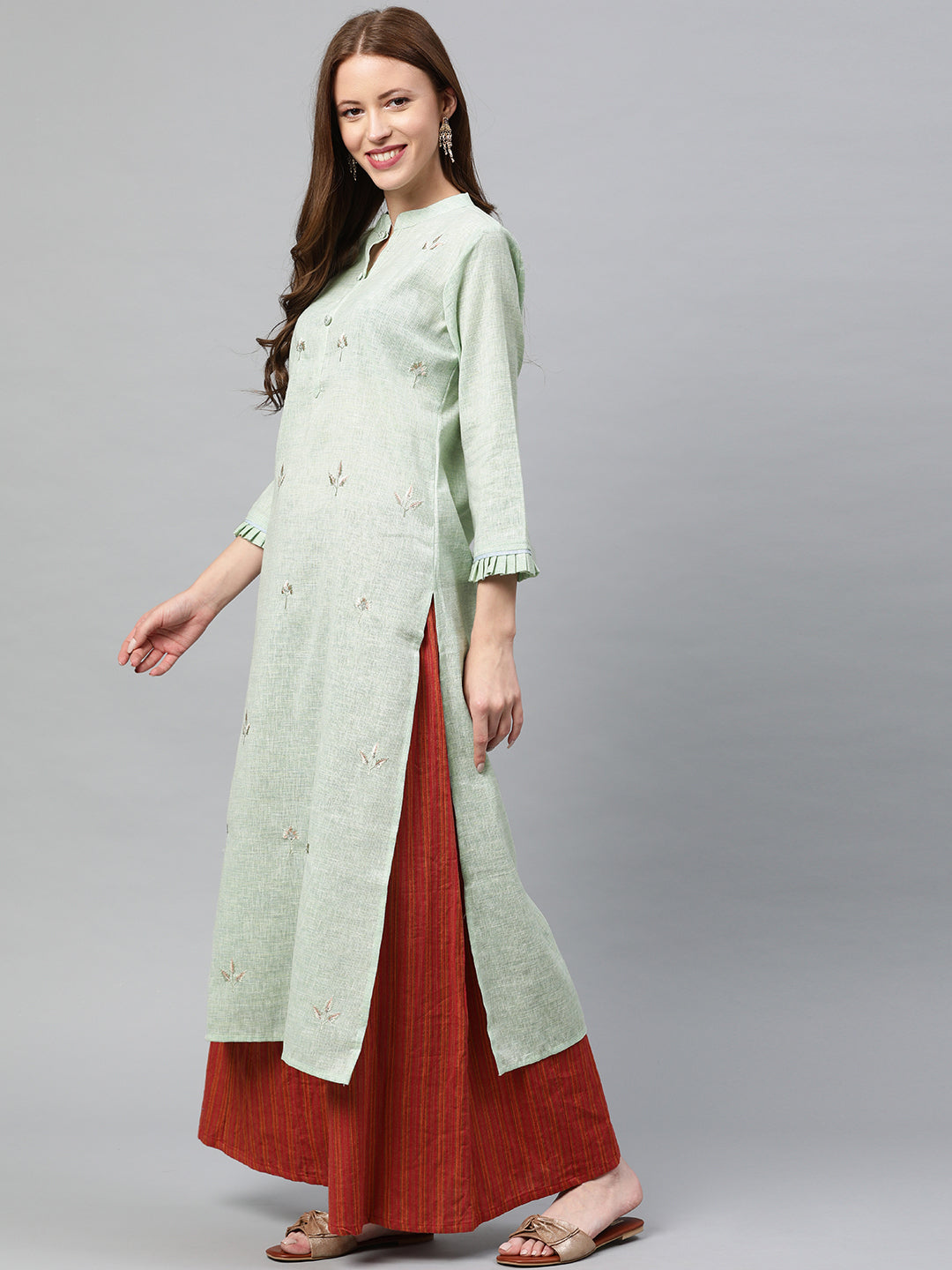 Neerus Green slub cotton embroidered straight kurta - side view