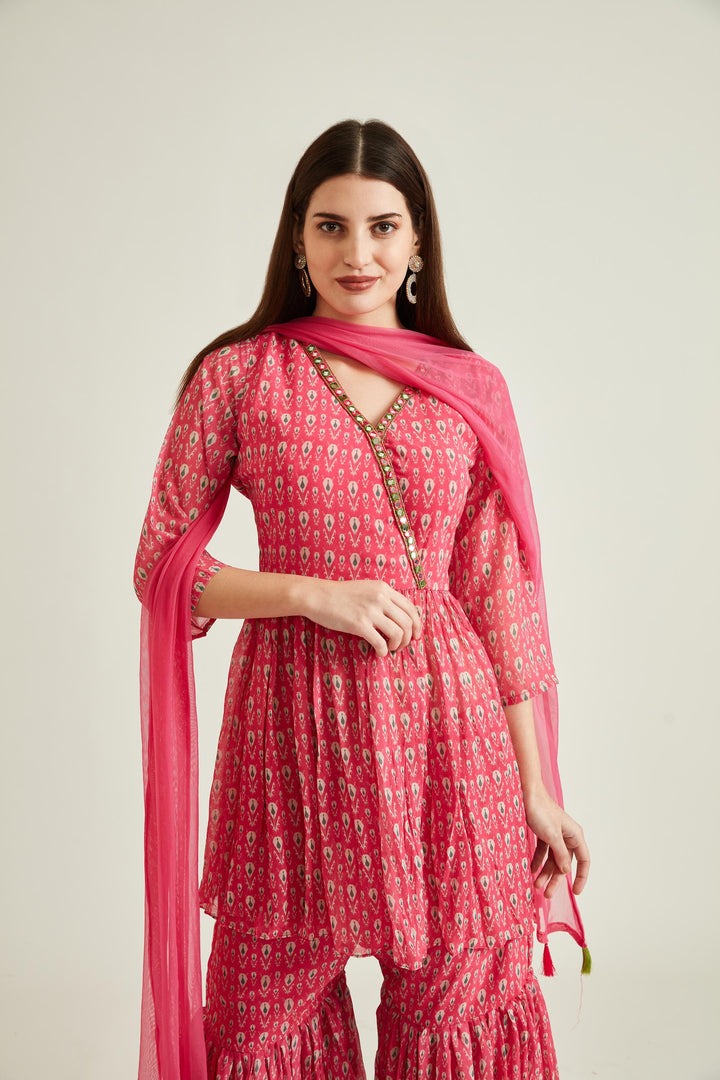 Neerus Pink georgette embellished kurta set - side view