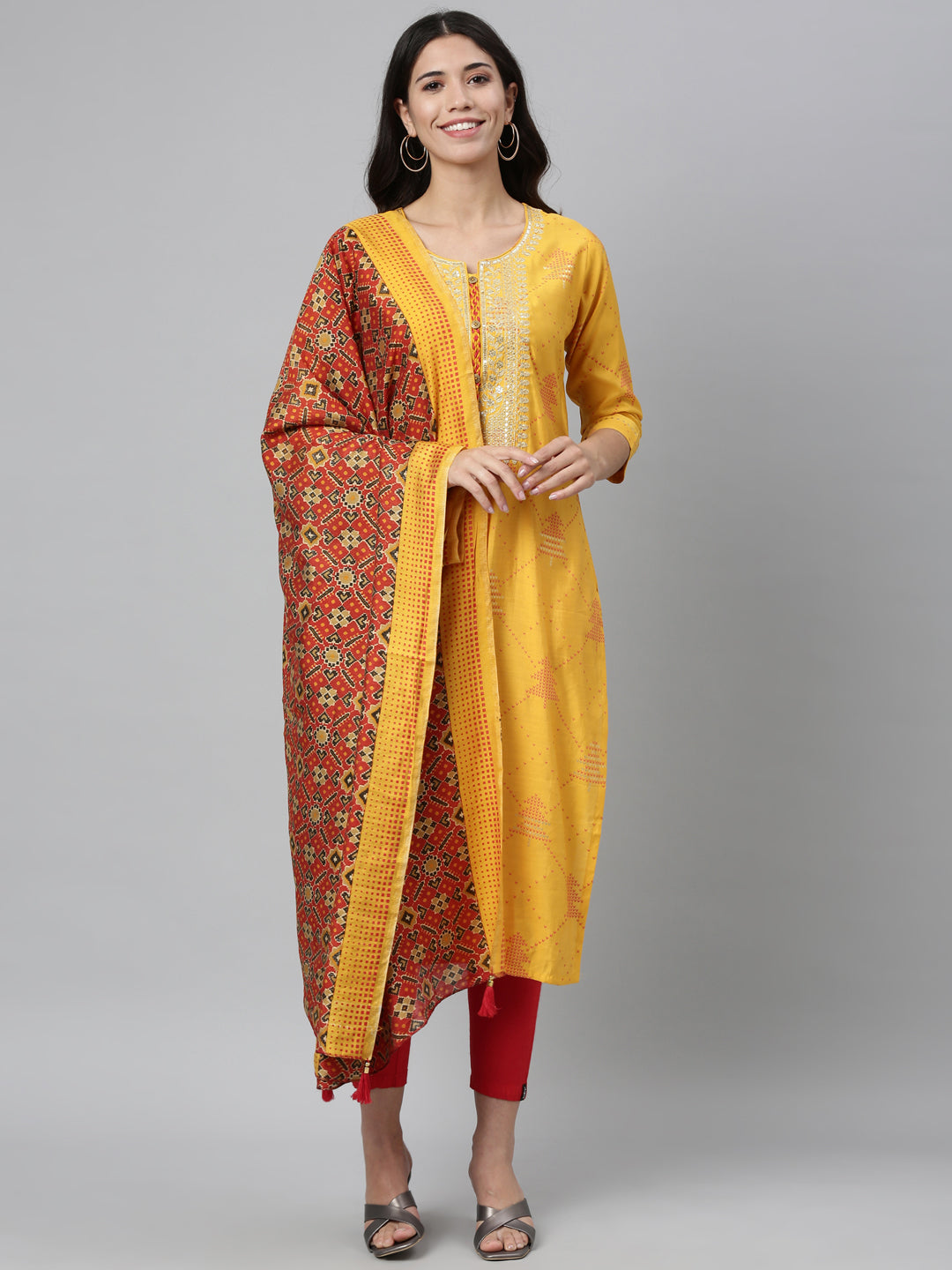 Neerus Yellow modal embellished kurta set - front view