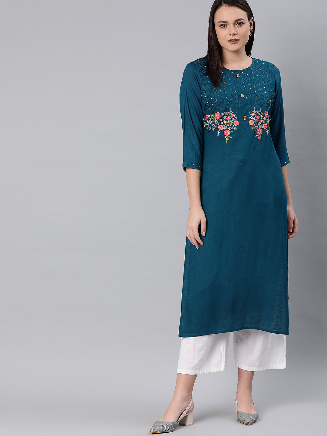 Neerus Green rayon embroidered straight kurta - front view