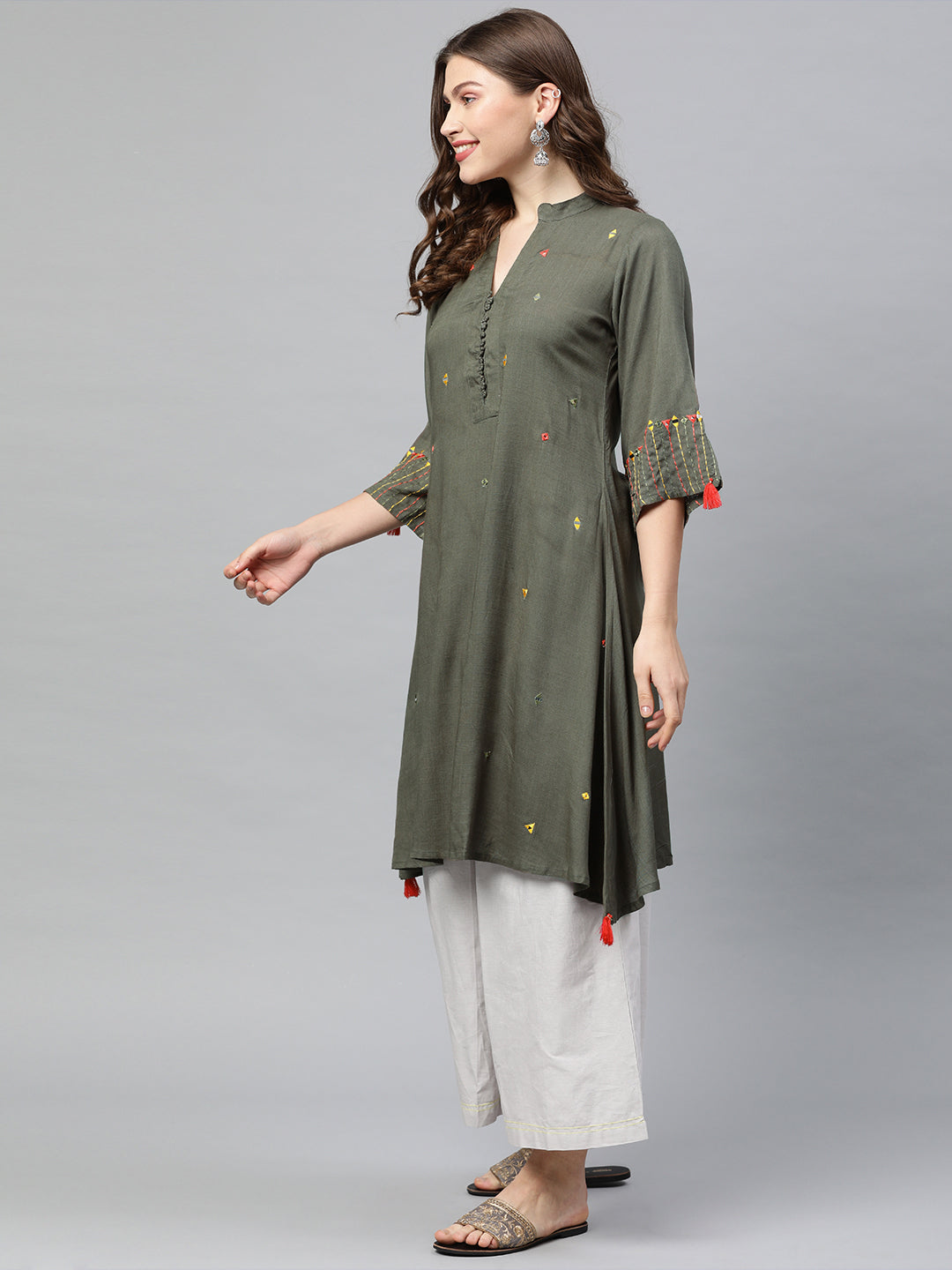 Neerus Green rayon embroidered straight kurta - side view