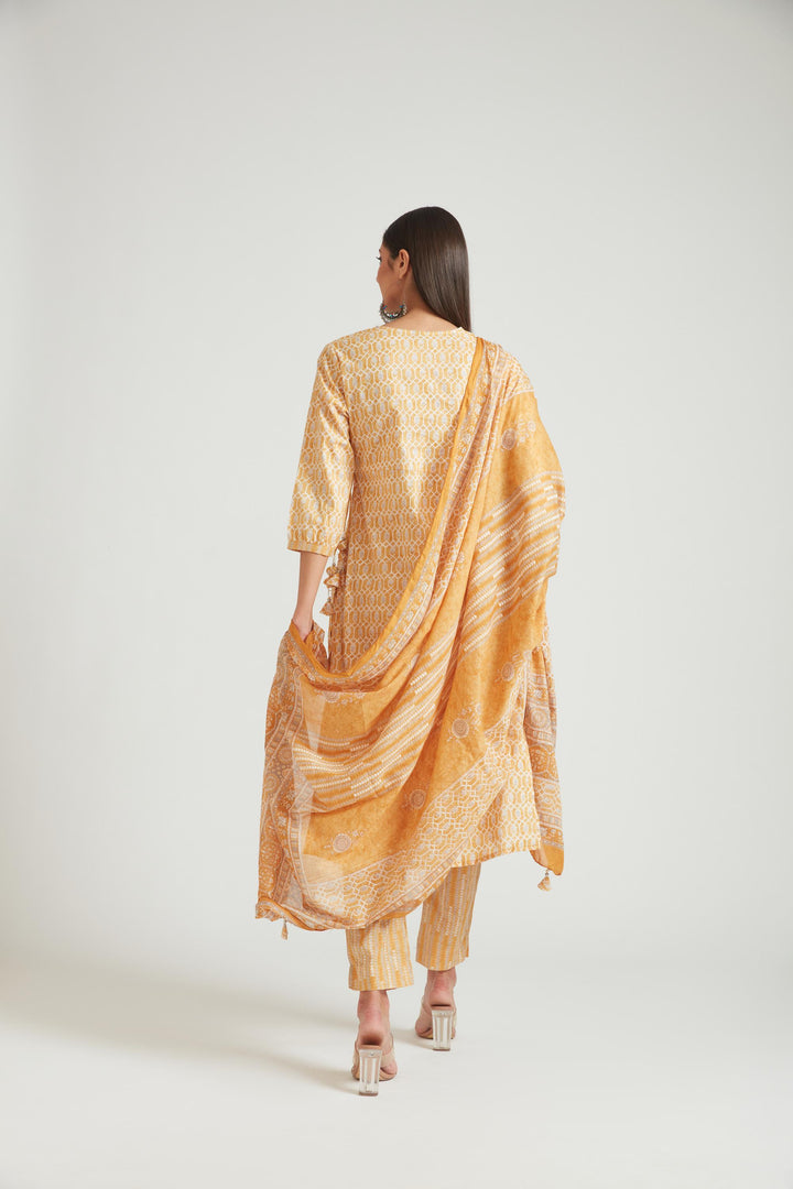 Neerus Yellow muslin straight kurta set - back view