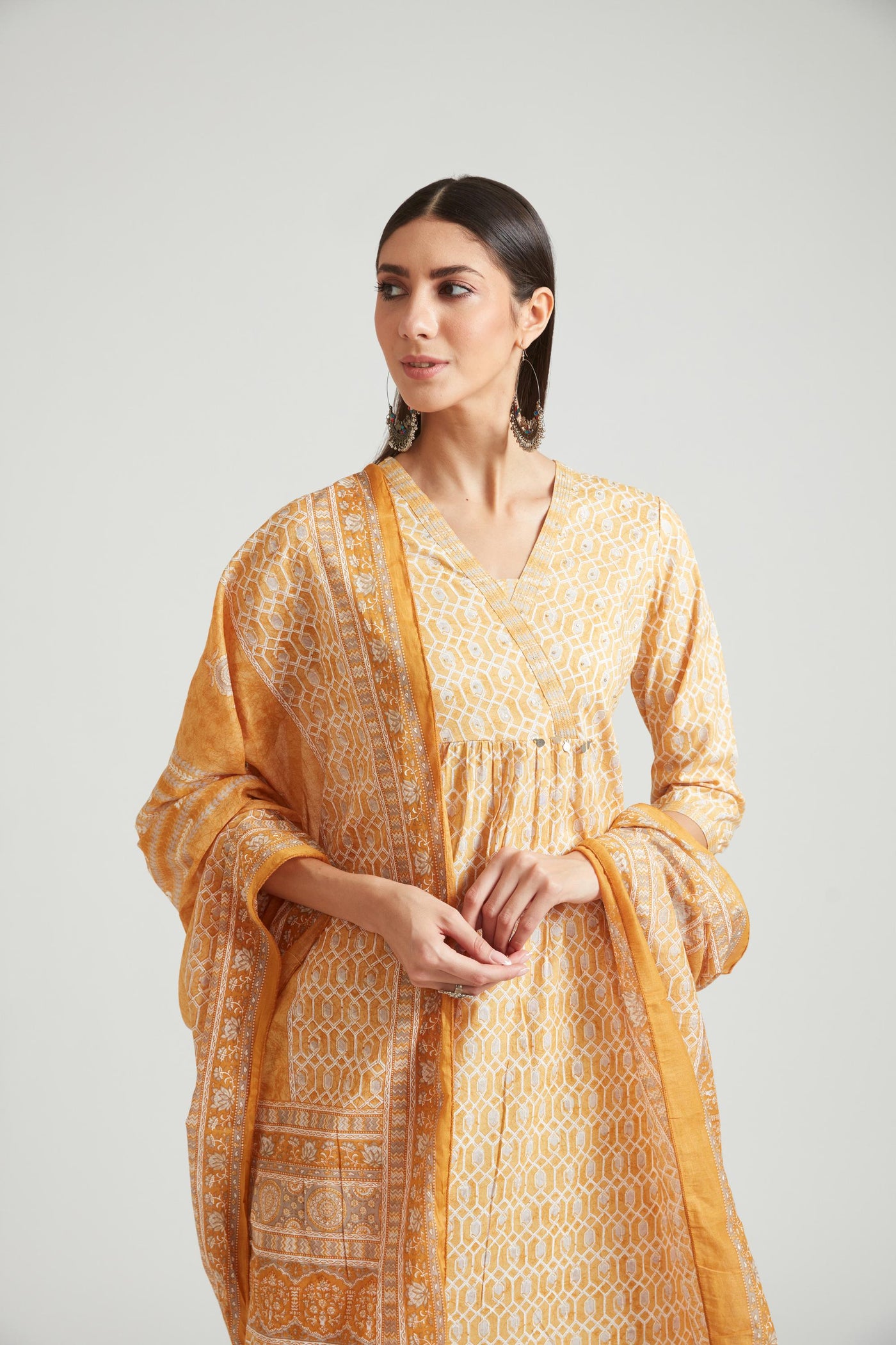 Neeru's Mustard Color Muslin Fabric Salwar Kameez