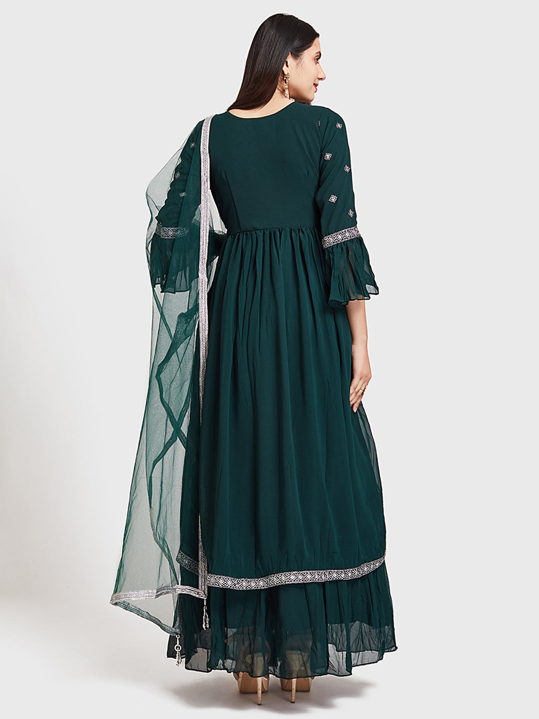 Neerus Green embroidered kurta set with skirt and dupatta - back view